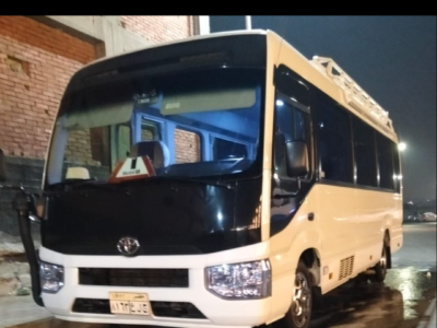 Book Now – Toyota Coaster Chauffeur Service to Triumph Luxury Hotel Cairo