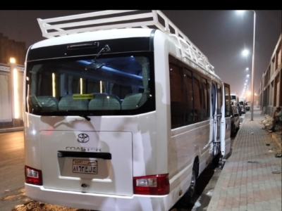 Book Now – Toyota Coaster Chauffeur Service to Triumph Luxury Hotel Cairo